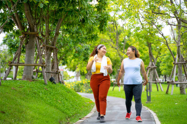Group of people are going to work out at the park. Healthy lifestyle concept.